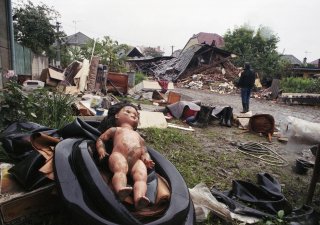 Záplavy na Moravě a ve Slezsku v červenci 1997 si vyžádaly 50 lidských obětí. Nejpostiženější obcí se staly Troubky nedaleko Přerova (na snímku).