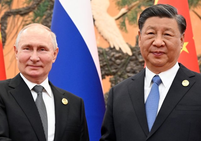 Ruský prezident Vladimir Putin a čínský prezident Si Ťin-pching