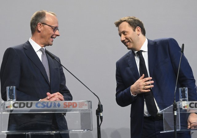 Friedrich Merz, šéf CDU a Lars Klingbeil z SPD