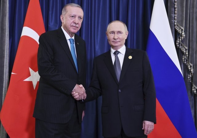 Turecký prezident Recep Tayyip Erdogan a jeho ruský protějšek Vladimir Putin