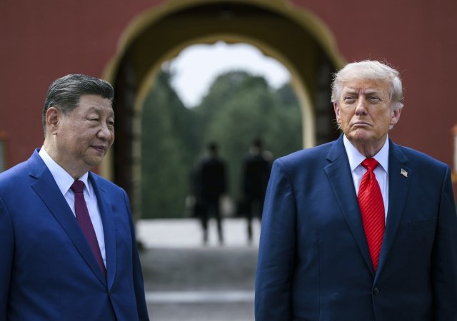 Čínský prezident Si Ťin-pching a jeho americký protějšek Donald Trump