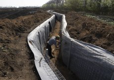Budování nových obranných pozic poblíž ruských hranic v Charkovské oblasti