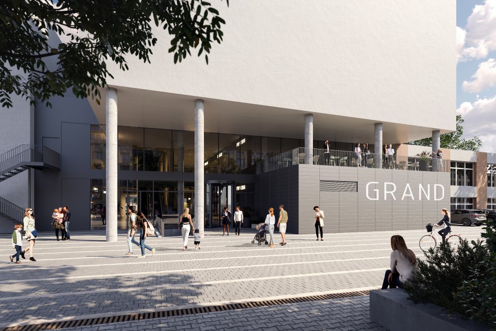 Památkově chráněný Grand má na fasádě modrý obklad. Původně byl hotelem, později sídlem okresního úřadu a díky kavárně, restauraci či vinárně byl také centrem společenského dění. (na snímku vizualizace)