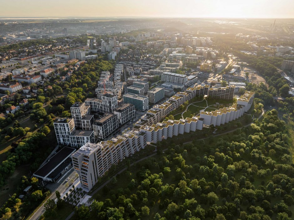 Středobodem projektu je centrální park o rozloze víc než jednoho hektaru s vodní plochou, který bude přístupný rezidentům i veřejnosti. Celkově bude přibližně polovina řešeného území věnována veřejným prostranstvím a zeleni. Součástí projektu jsou také finanční i nefinanční kontribuce městu v celkovém objemu přes 120 milionů korun, včetně investic do veřejné infrastruktury a rozvoje dopravní obslužnosti – tramvajového propojení z Olšanské ulice, které zajistí rychlé spojení do centra města.