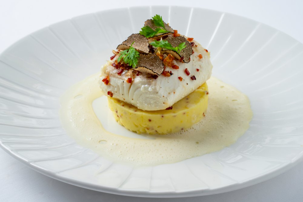 Ryby a mořské plody patří k poznávacím znamením Kampa Parku. Na snímku halibut z jeho kuchyně.