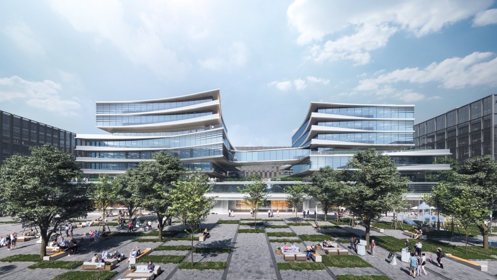 Kancelářské centrum propojuje na úrovni ulice atrium, v pátém patře most.